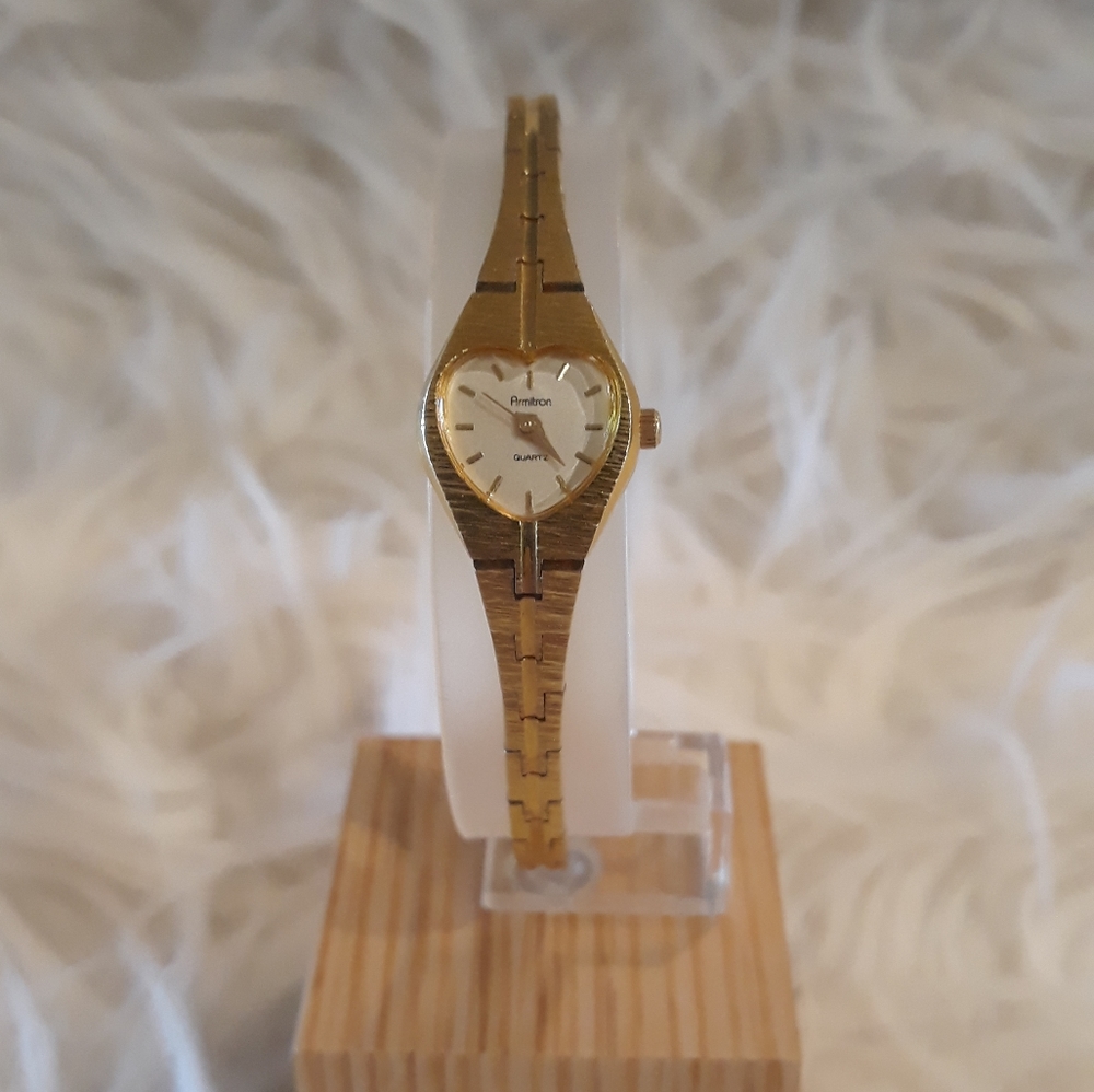 Armitron gold tone heart shaped womens watch